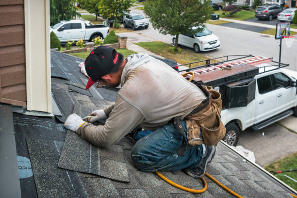 Professional Emergency Roof Repair technician working in Curlew, WA